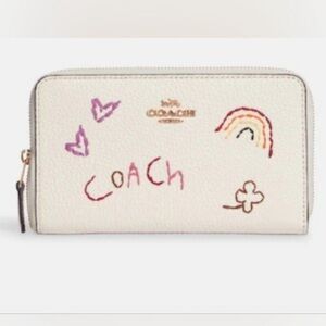 COACH Medium ID Zip Wallet
With Diary Embroidery in Gold/ Chalk